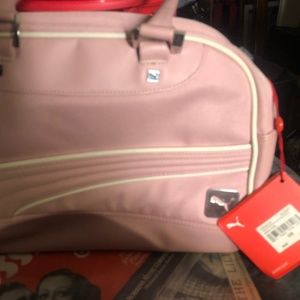 Puma women’s mesh grip shoulder bag. never been used. Perfect